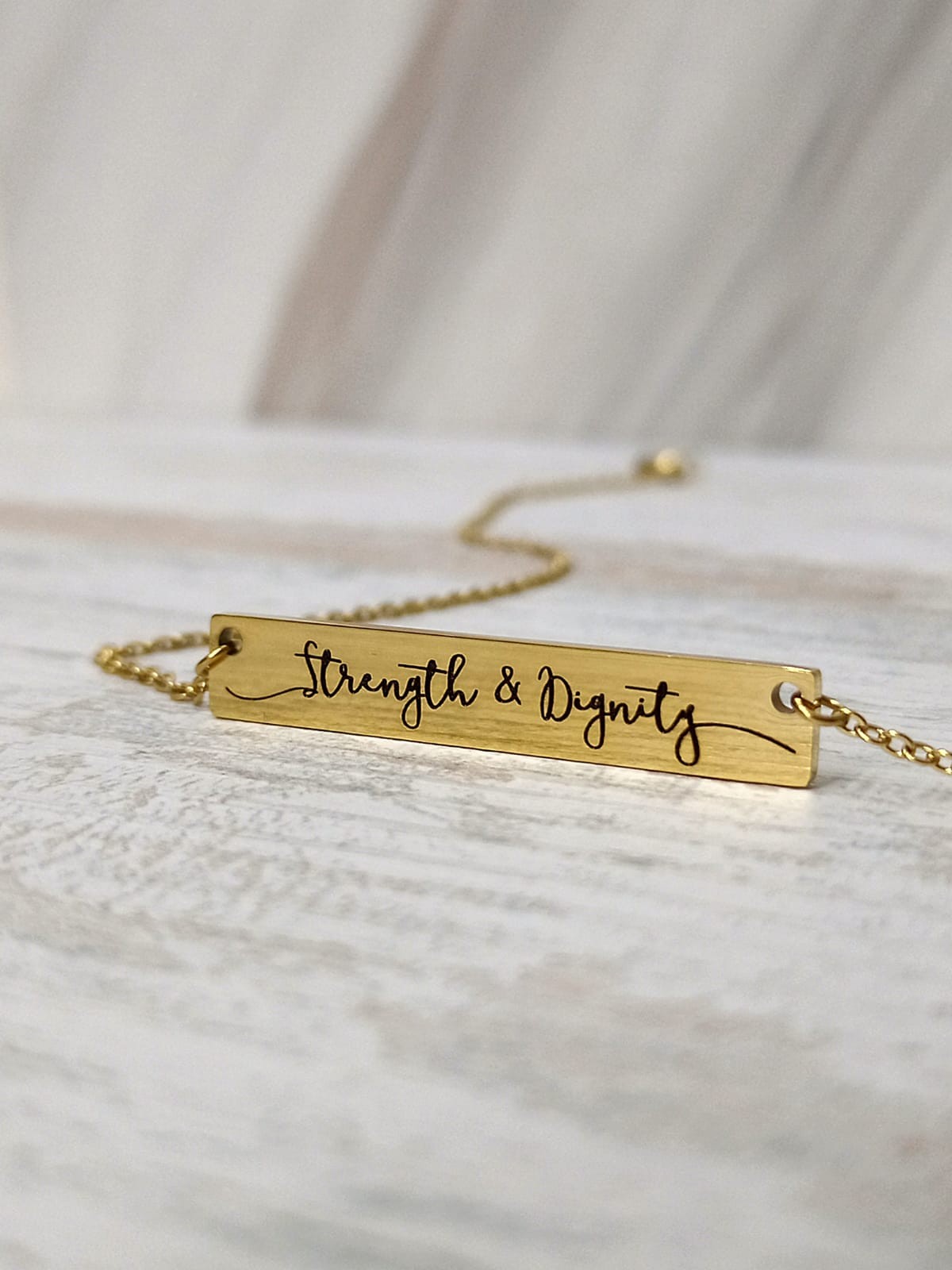 STRENGTH & DIGNITY BAR NECKLACE (GOLD)